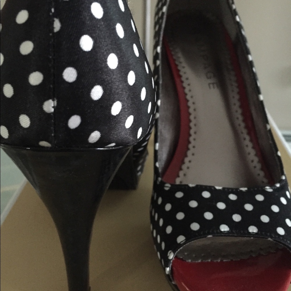 Black and white with red accent high heel shoe